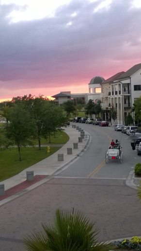 A beautiful evening here in Ave. A family is taking a carriage ride through the town of Ave and enjoying the sunset. 